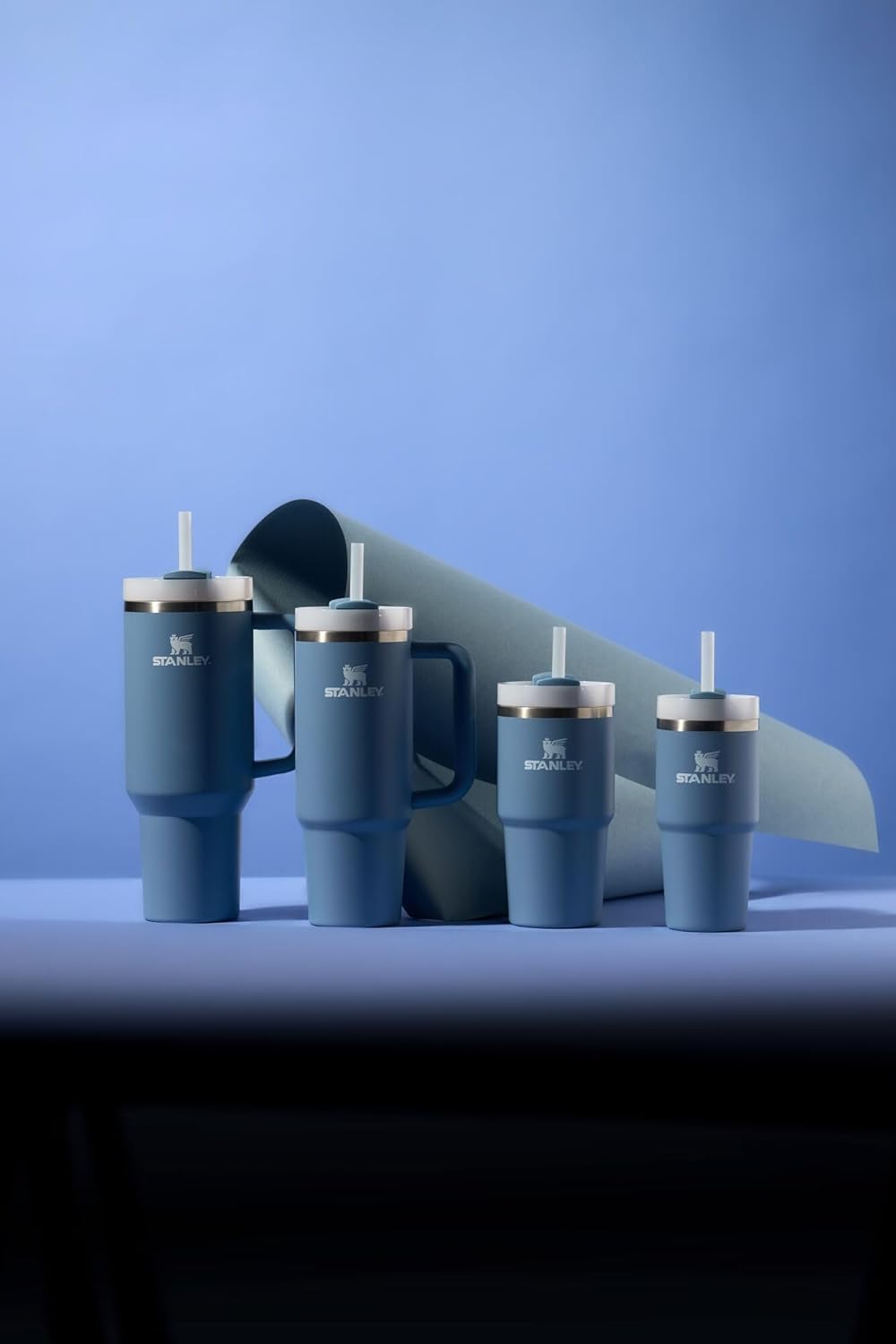 Stanley Quencher H2.0 Tumbler with Handle and Straw 30 oz | Flowstate 3-Position Lid | Cup Holder Compatible for Travel | Insulated Stainless Steel Cup | BPA-Free | Indigo