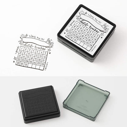 Habit tracker with black and green cases on a white background